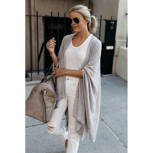 Übergröße Strickjacke mit unregelmäßigem Saum